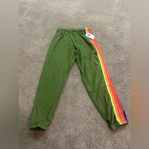Aviator Nation Pants - NWT AVIATOR NATION
WOMEN'S 5 STRIPE SWEATPANTS JUNGLE GREEN/NEON RAINBOW